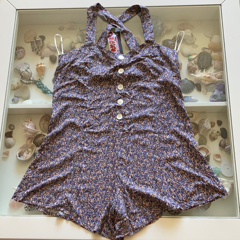 Brand New. RIPCURL shorts/dress. Floral design.